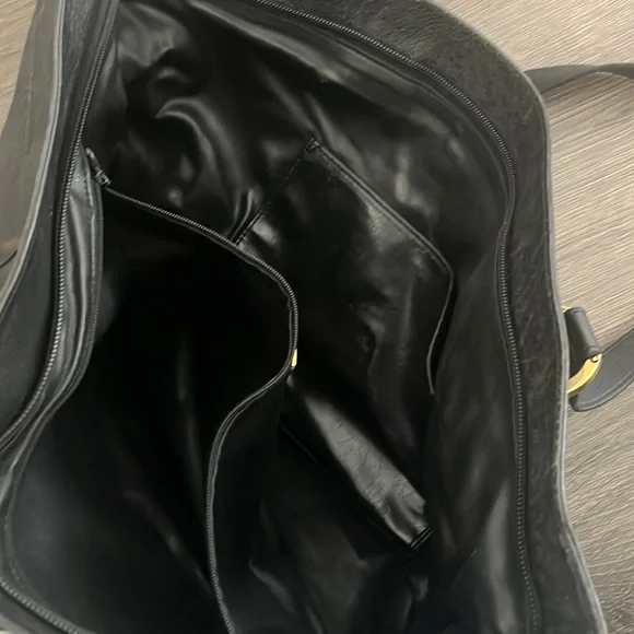 Tiffany and Co. leather handbag in good condition. Gold hardware Zipper closure